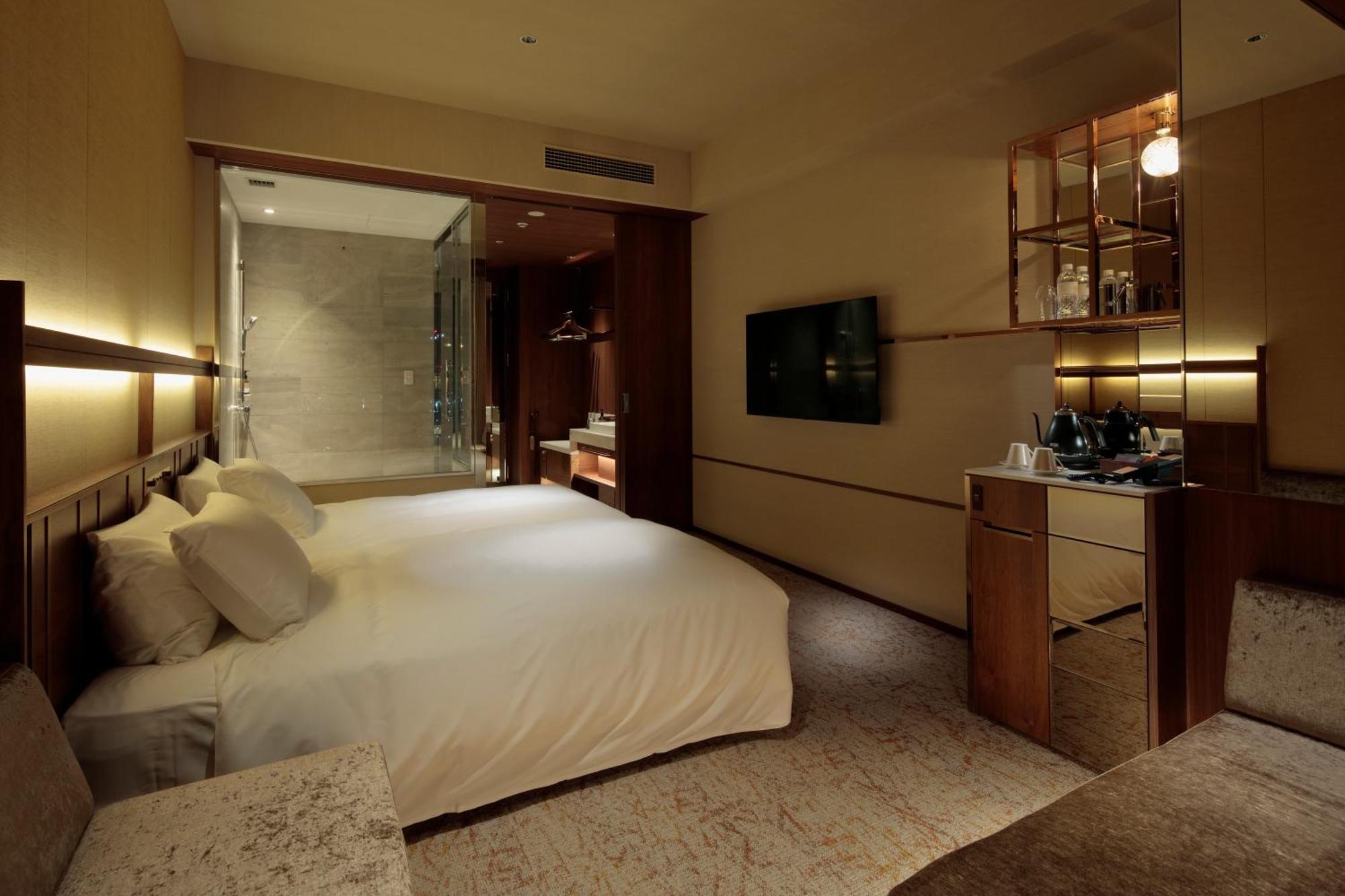Candeo Hotels Osaka The Tower Phòng bức ảnh A room at the hotel